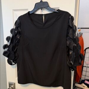 Elegant Black Women's Top with Textured Sleeves